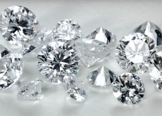 Round brilliant polished diamonds.